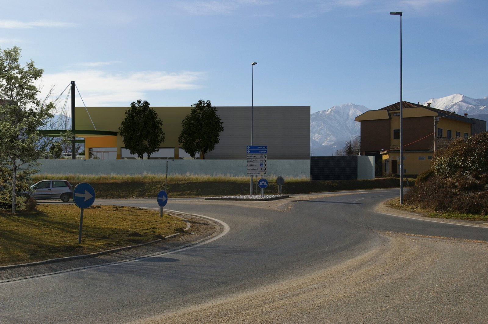 riqualificazione di edificio industriale a commerciale